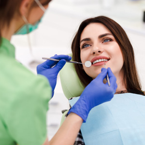 Woman getting a dental checkup