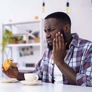 Man with tooth pain