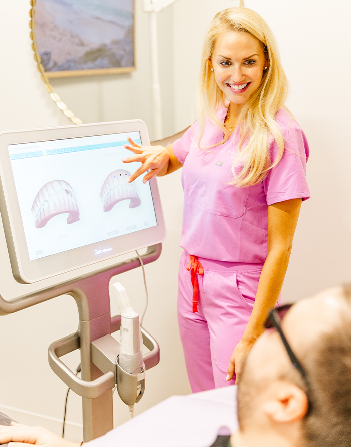 Doctor Lundgren smiling at a dental patient