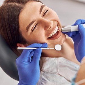 Woman smiling in the dental chair
